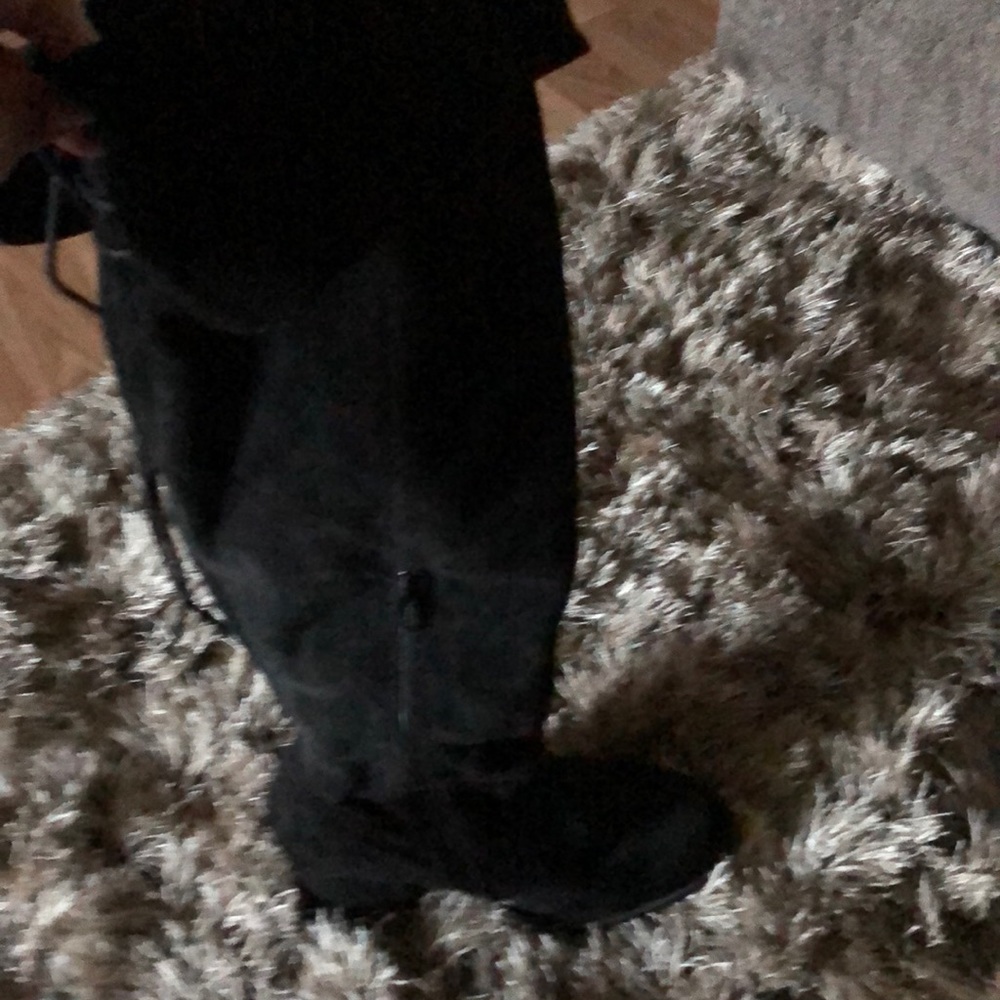 Black tall boots